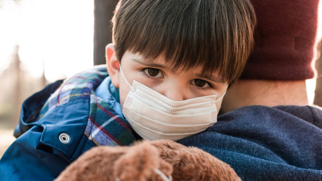 Father and son using air masks