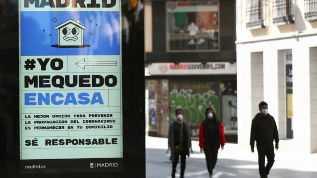 Ad advising people to be responsible and stay home is displayed in central Madrid