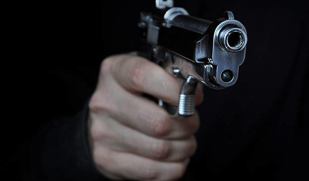 Shooting a gun in night