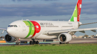 Tap air portugal airbus a330 taxiing at lisbon airport