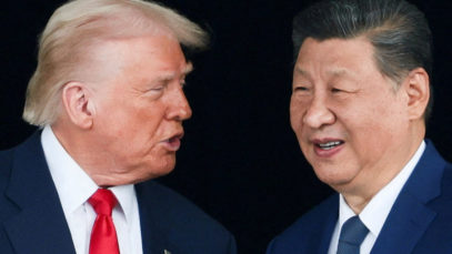 FILE PHOTO: U.S. President Donald Trump meets with Chinese President Xi Jinping on the sidelines of the APEC summit, in Busan